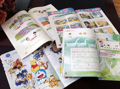 青岛小学新教材像图画书页页有插图 讲课犹如讲故事
