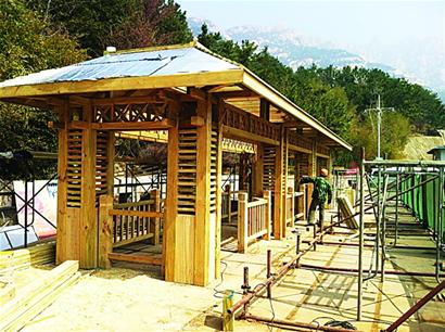 崂山十大工程进度探访:提供轮椅婴儿车(图)