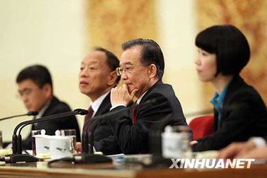 3月14日,国务院总理温家宝在北京人民大会堂与中外记者见面,并回答记者提问。 新华社记者刘卫兵摄