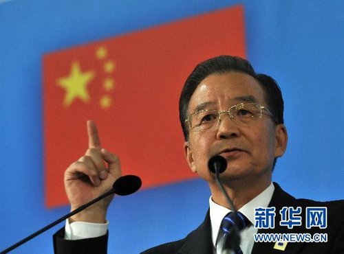 温家宝:人民币升值过快对世界是灾难