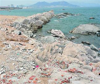 青岛独有红礁石被填埋 成极地金岸内海