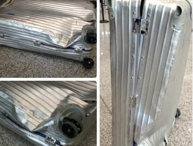 被压坏的行李箱