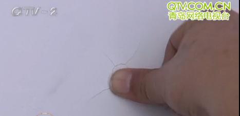 青岛保利百合花园二楼变一楼又现蜂窝墙 整楼密布孔眼 青岛保利百合花园二楼变一楼又现蜂窝墙 整楼密布孔眼