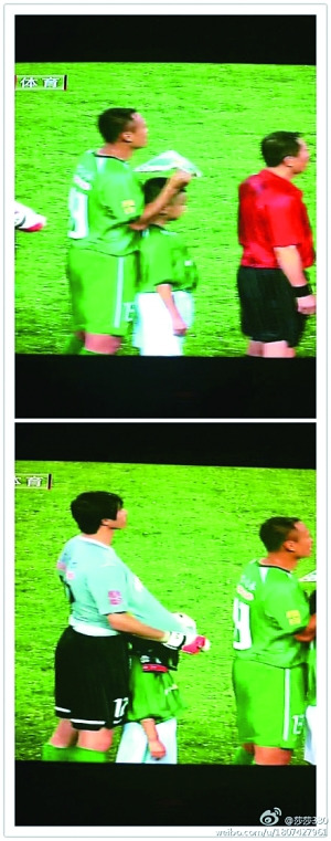 国安比赛球迷冒暴雨助威 球员为球童遮雨获赞