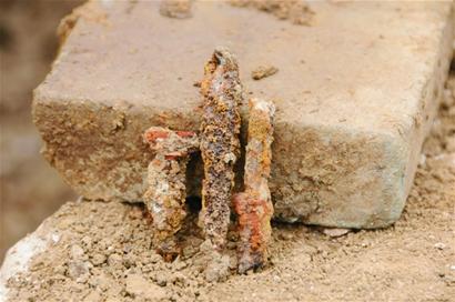 青岛即墨挖出宋代古墓 55枚千年铜钱重见天日