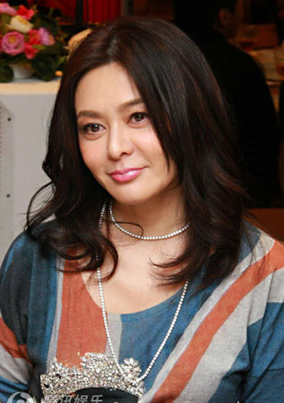 关之琳陈泰铭绯闻传足5年 同游多次曝光一直否认