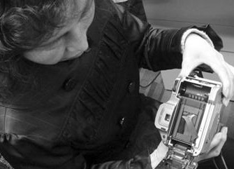 摄影店冲印胶卷弄坏相机 顾客投诉不认账