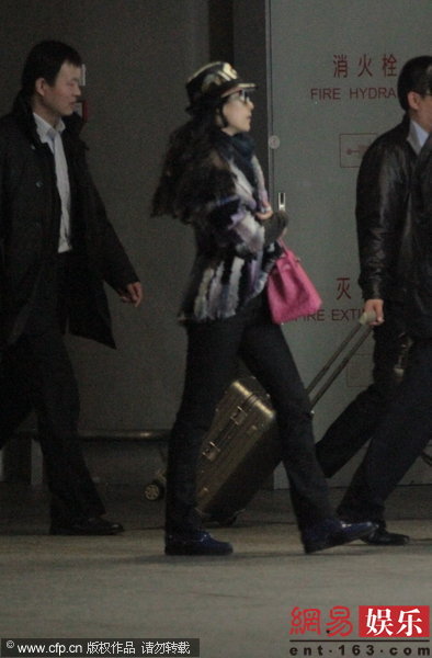 章子怡秘游回国捞金