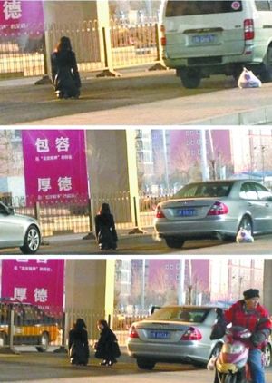 女孩马路中央跪求男友原谅 不听劝致交通瘫痪 女孩马路中央跪求男友原谅 不听劝致交通瘫痪