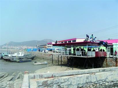 崂山海边惊现仿造栈桥 盖海景螃蟹会馆