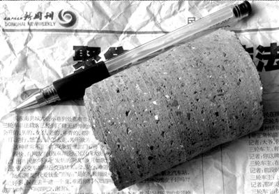 圆通快递物品半途变身 寄出手机收到混凝土块