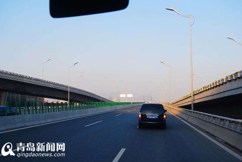 高清:重庆路全线通车 青岛第一堵如今变通途