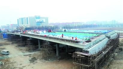 重庆路最后施工点月底通车 市北直通城阳 重庆路最后施工点月底通车 市北直通城阳