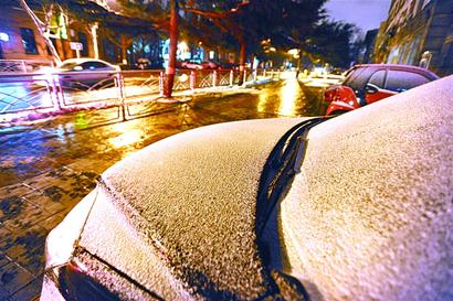 青岛昨又飘雪今降温最低-9℃