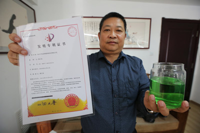 青岛锅炉工卖房发明环保取暖器 取暖费省千元