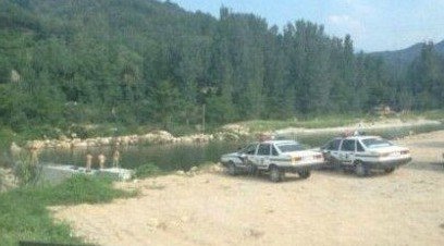 河南官方回应民警公车私用裸泳事件:正调查 河南官方回应民警公车私用裸泳事件:正调查