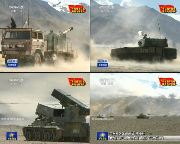 解放军雪山下秀大批主战武器 实弹射击