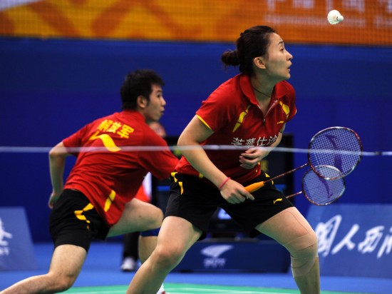 图文-全运羽球解放军队获混双冠军何汉斌很自信